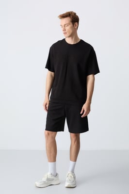 Herren Oversized Baumwollmischung T-Shirt und Shorts Set