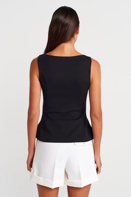 Taillierte ärmellose Peplum-Bluse