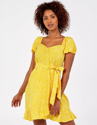 Mini-robe à manches bouffantes