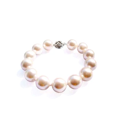 Bracelet en Perles de culture blanches et fermoir fleur en Argent 925