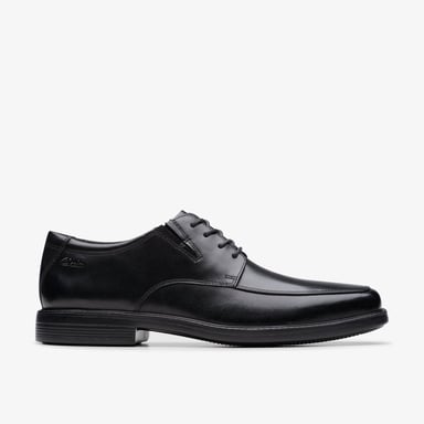 Cosgrove Schürze Schwarze Lederschuhe