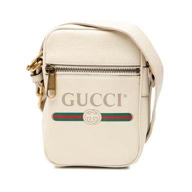 Gebrauchte Mini-Kreuztasche aus Rindleder mit Logo