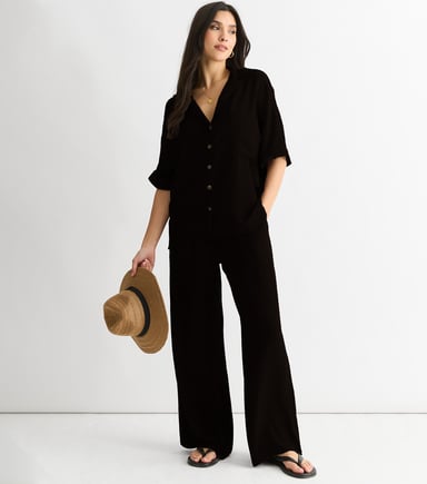 Schwarzes Air Flow Shirt in Übergröße