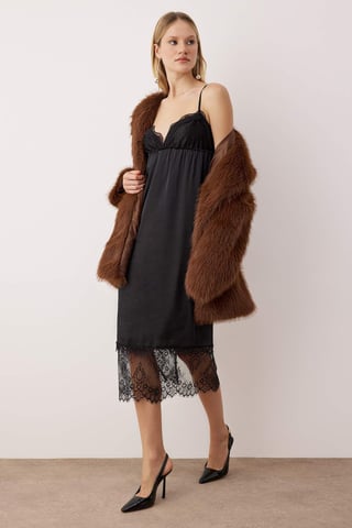 Elegantes, ärmelloses Midi-Kleid für Damen, ideal für den Abend.