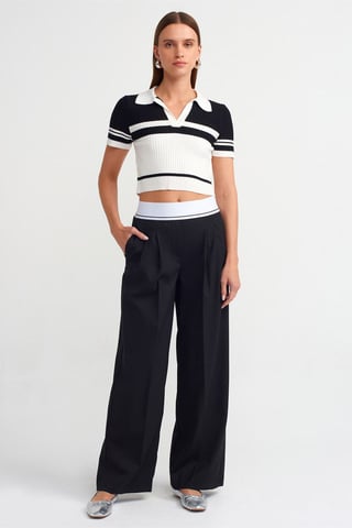 Hoch taillierte weite Crepe-Hosen