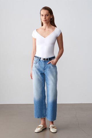 Hüfttaschenweite Weite Capri-Jeans