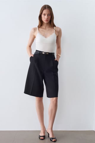 Spitzen-V-Ausschnitt ärmellose Cami-Bluse
