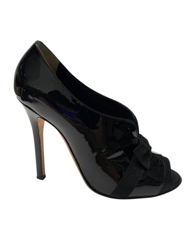 Dolce & Gabbana Bogen-Stiefelette aus schwarzem Lackleder