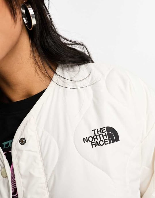The North Face Ampato long quilted liner jacket in cream Exclusive at ASOS-White