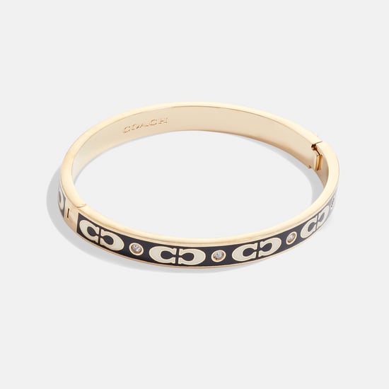 Kissing C Enamel Hinged Bangle - Image 1