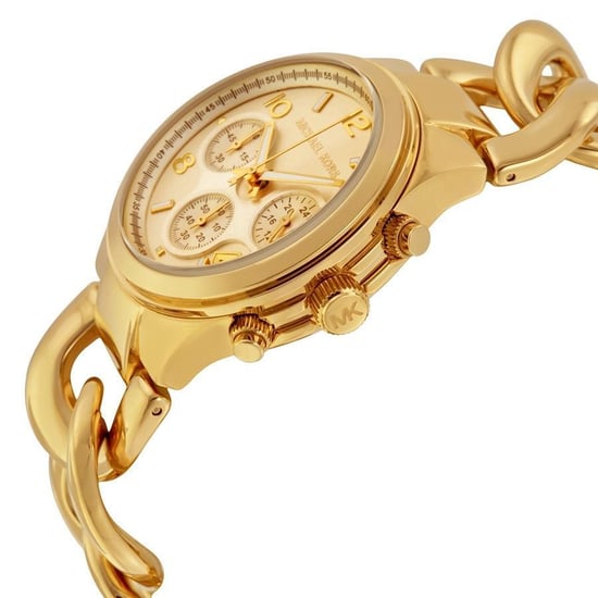 Robuste und stilvolle Damenuhr der Marke Michael Kors in der Farbe Gold. Die Uhr ist aus rostfreiem Stahl gefertigt. Das Armband ist ebenfalls aus Edelstahl, hat eine Faltschließe und kann kleiner gemacht werden. Das Gehäuse der Uhr hat einen Durchmesser - Image 2