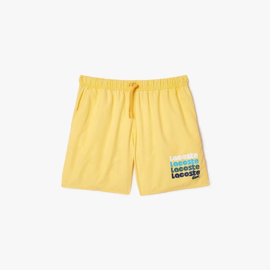 Men's Lacoste Mid Length Washed Effect Swim Trunks in Yellow