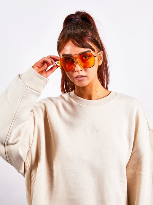 Gold rounded aviator style sunglasses