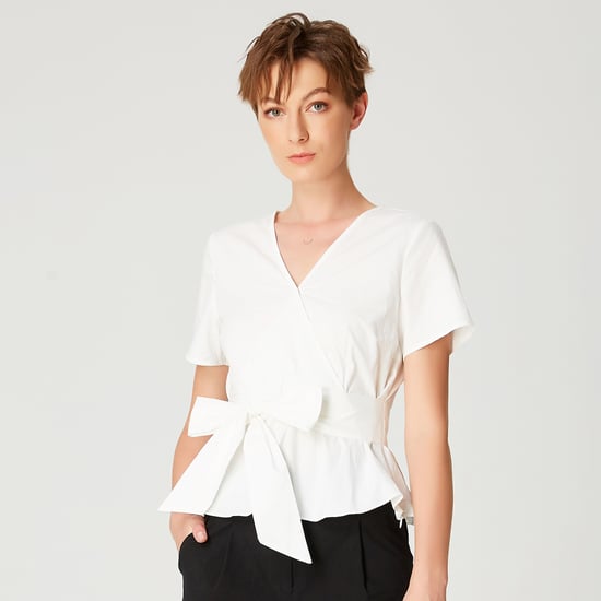 Peplum top with wide bow belt