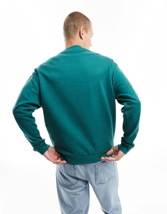 ASOS DESIGN oversized sweatshirt in green