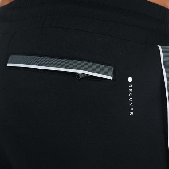 Pantalon survêtement UA Recover tricot - Image 6