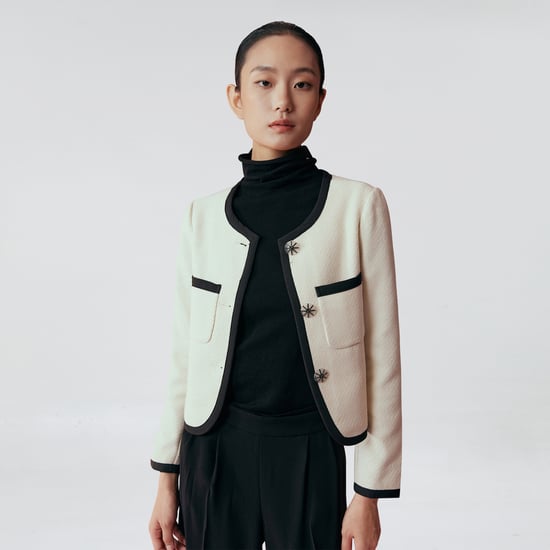 Schräg geschnittene Jacke in Kontrastfarbe - Image 1