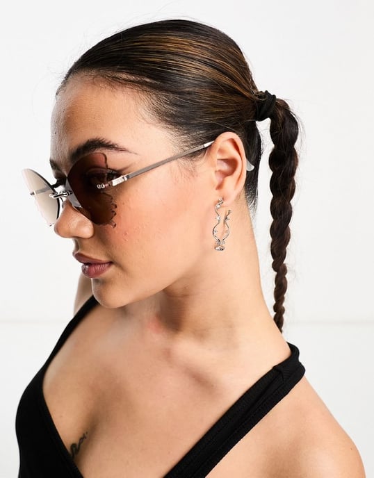 ASOS DESIGN butterfly rimless sunglasses in purple