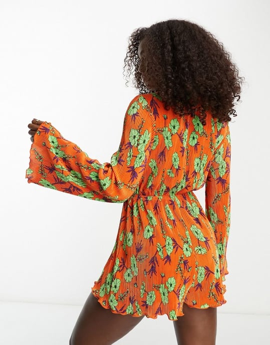 ASOS DESIGN plisse knot front playsuit in floral-Multi