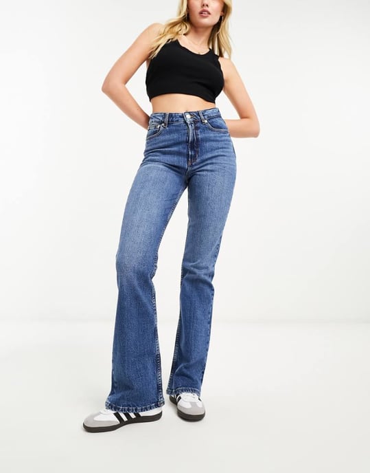 ASOS DESIGN flared jeans in mid blue