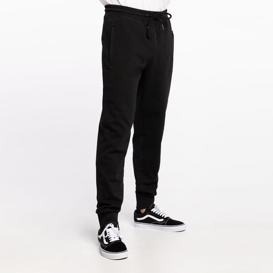 The North Face Herren NSE Licht Zip Taschen Jogger schwarz - Image 3