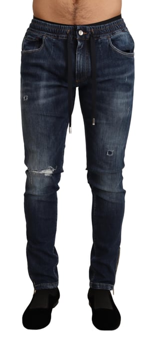 Dolce & Gabbana - Jean en denim stretch bleu en lambeaux pour hommes - Image 1