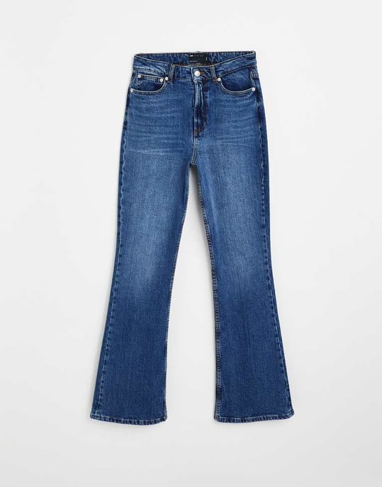 ASOS DESIGN flared jeans in mid blue