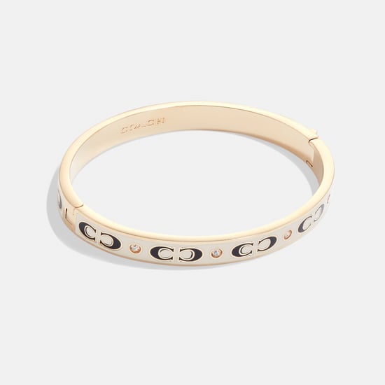 Kissing C Enamel Hinged Bangle - Image 1
