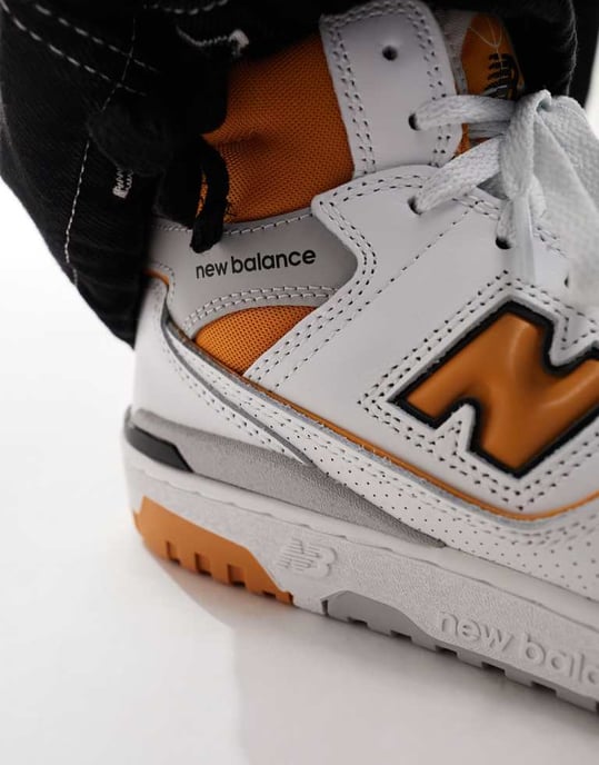 New Balance Unisex 650 trainers in white and orange