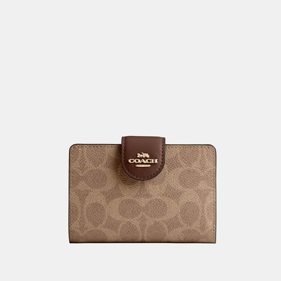 Medium Corner Zip Wallet in Signature Canvas - Image 1