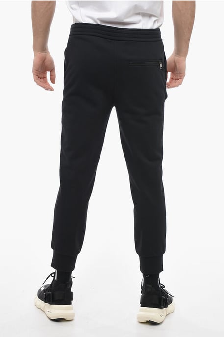 Skinny Fit Sweatpants aus Baumwolle mit Bündchen in Schwarz - Image 2