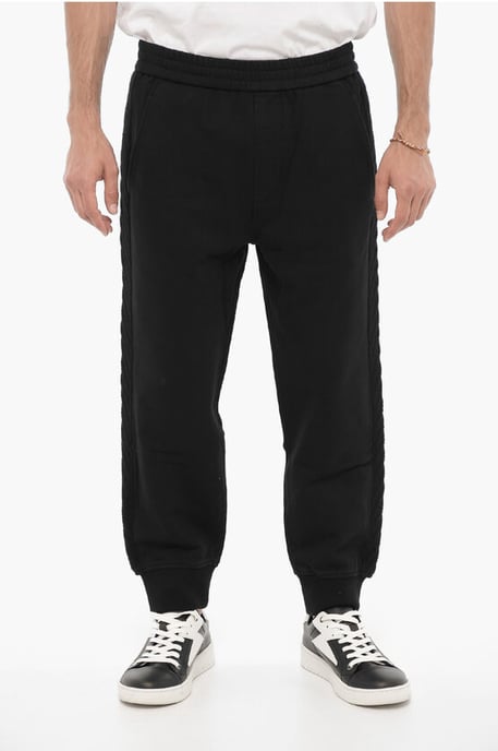 Einfarbige Jogginghose mit seitlichen Wollbändern in Schwarz - Image 1