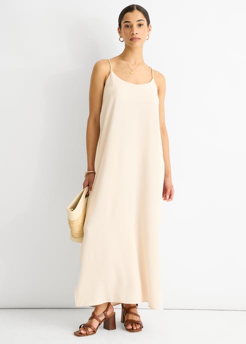Beigefarbenes Riemchen-Kreuzrücken-Airflow-Kleid in Übergröße - Image 1