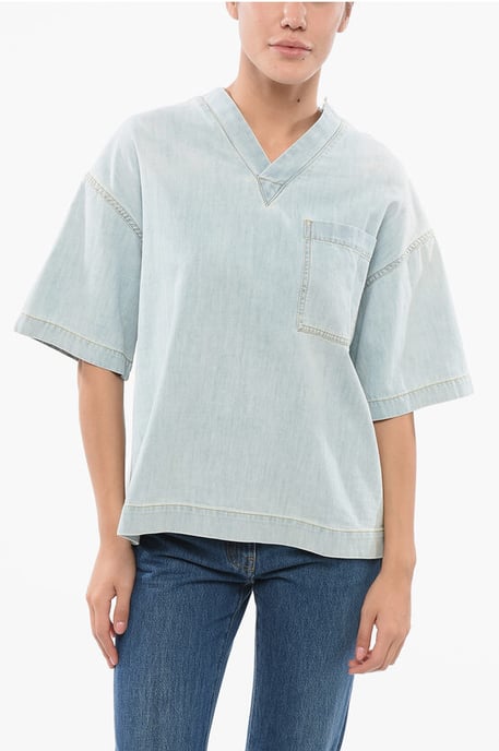 Leicht gewaschene Jeansbluse mit Brusttasche in Hellblau - Image 1