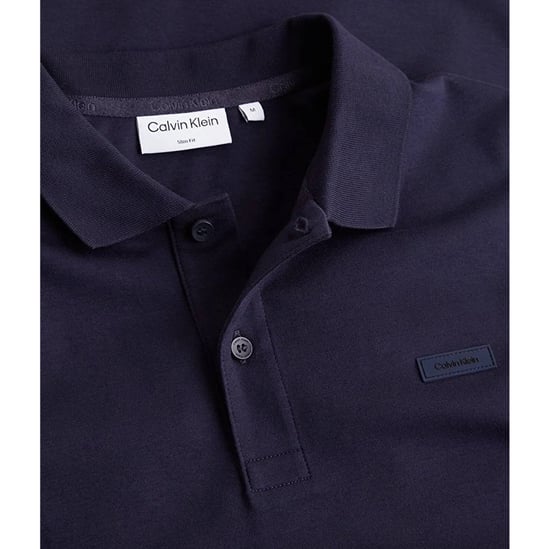 Herren-Poloshirt der Marke Calvin Klein. Die Polos von Calvin Klein sind aus 100% Bio-Baumwolle und haben eine schmale Passform. Die weiche Baumwolle sorgt für hohen Tragekomfort.  Marke: Calvin KleinModellname: Liquid Touch Slim PoloKategorie: Herren-Pol - Image 2