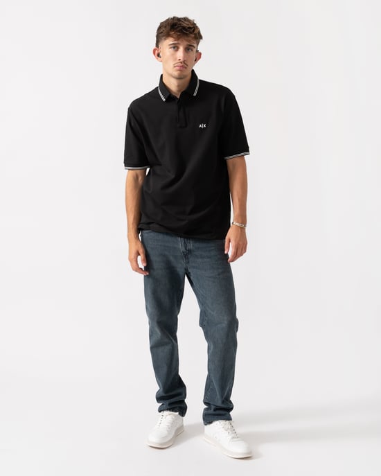 UC001 Polo-Shirt Polo-Shirt in Schwarz - Image 3