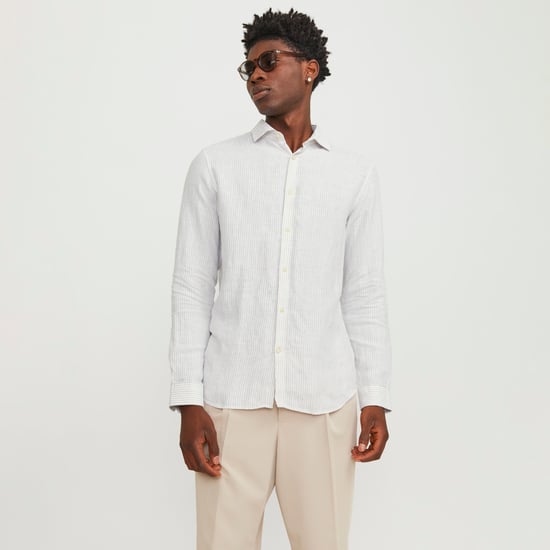 Herrenhemd der Marke Jack & Jones. Das Hemd ist aus hochwertigem Leinen gefertigt. Das luftige Material sorgt für einen herrlich leichten Tragekomfort.  Marke: Jack & JonesModellname: Parker Linen StripeKategorie: HerrenhemdenMaterialien: Baumwolle, Polye - Image 4