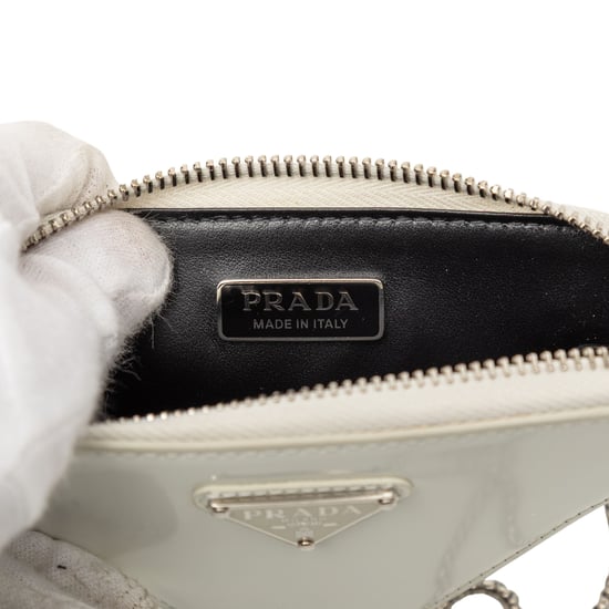Gebrauchte Mini-Tasche aus gebürstetem Leder mit Dreieckskette - Image 5