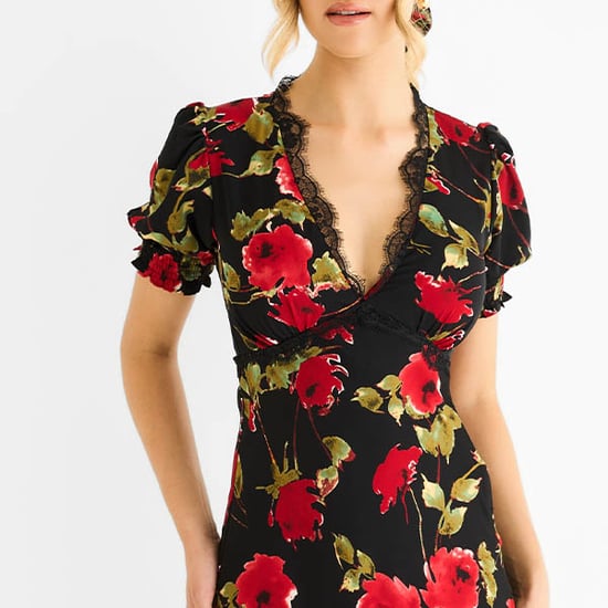 Schwarzes Midikleid mit floralen Spitzenverzierungen - Image 2
