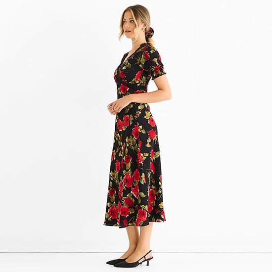 Schwarzes Midikleid mit floralen Spitzenverzierungen - Image 3
