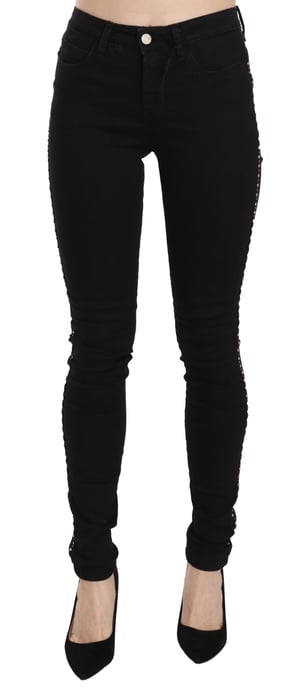 Schmal geschnittene Jeans mit seitlichen Verzierungen - Image 1
