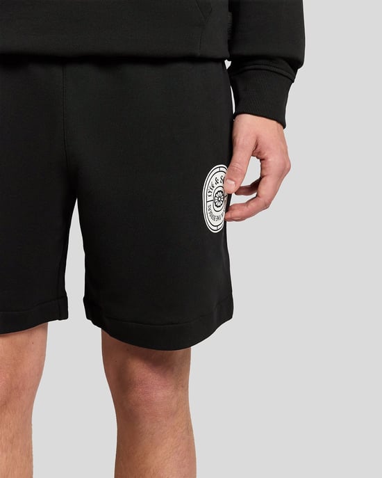 Grafisches Abzeichen Baumwoll-Sweatshorts - Image 3