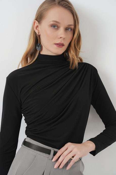 Taillierte Rollkragenbluse mit Drapé-Detail - Image 1