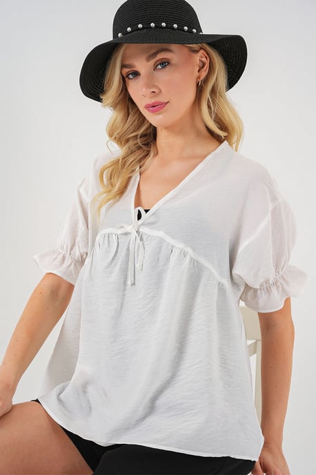 Strukturierte V-Ausschnitt-Bluse mit Schleife - Image 4