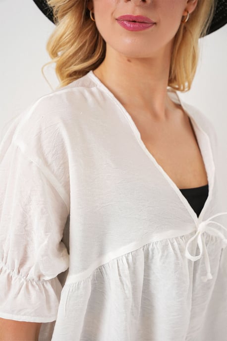 Strukturierte V-Ausschnitt-Bluse mit Schleife - Image 5