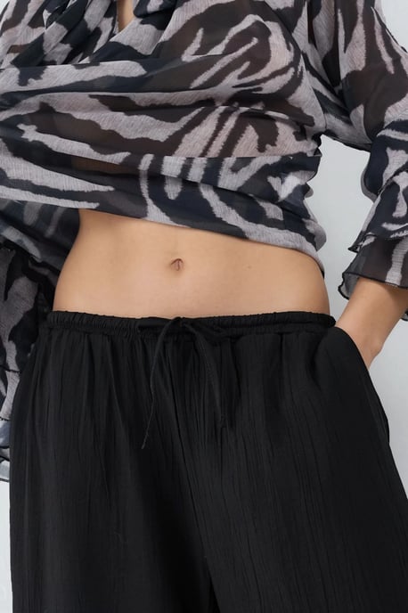 Weite Hosen mit elastischem Bund und Taschen - Image 6