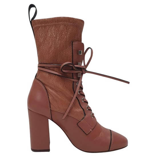 Stuart Weitzman Veruka Schnür-Stiefeletten aus rosa Leder - Image 1