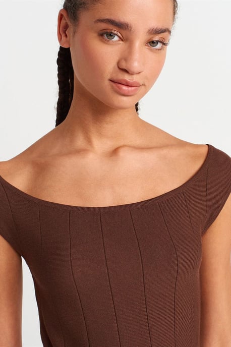 Figurbetonte gerippte Peplum-Bluse - Image 3