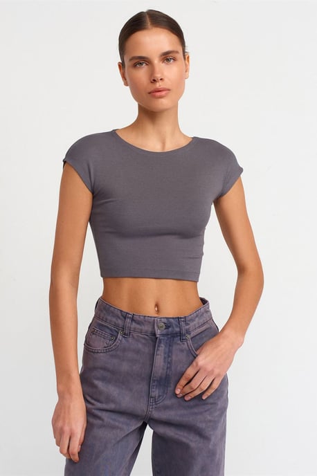 Schmal geschnittene Crop-Jersey-Bluse - Image 1