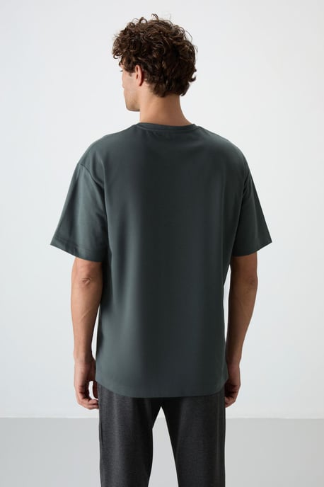 Tommy Life Oversized T‑Shirt mit Rundhalsausschnitt und Print - Grün - Image 5